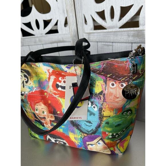 New! Disney Parks X Harveys Seatbelt Pixar Painted Limited Edition Tote Bag - Picture 2 of 9